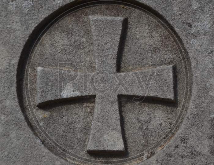 Maltese Cross In A Cemetery