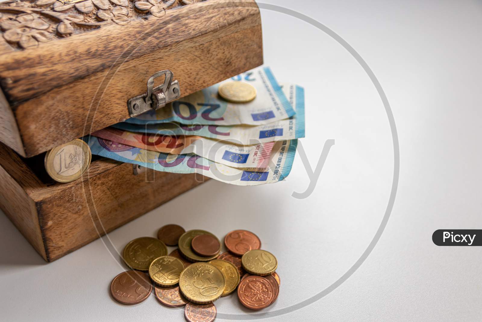Variety of different bank notes and coins from various countries like euro, pound, emirates money, cyprus bank note and others represent the international market and global financial market