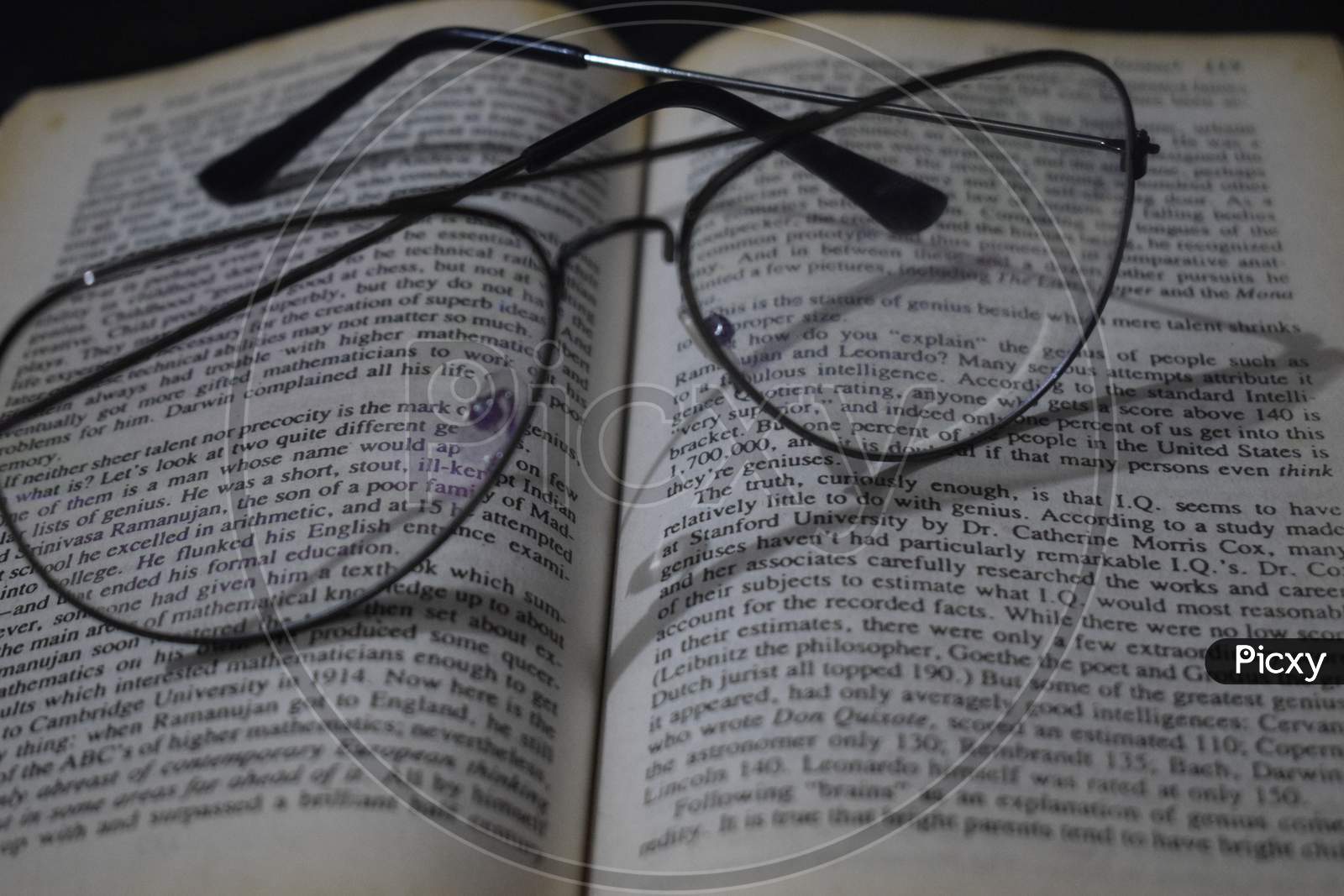 glasses with book in background