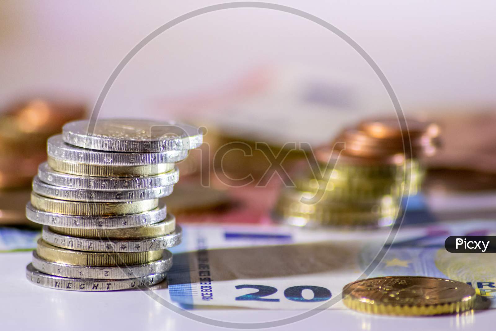 Bunch of european money with coins and bank notes show international finance with euro and europe, bets and wins or financial success as well as credit management and professional banking