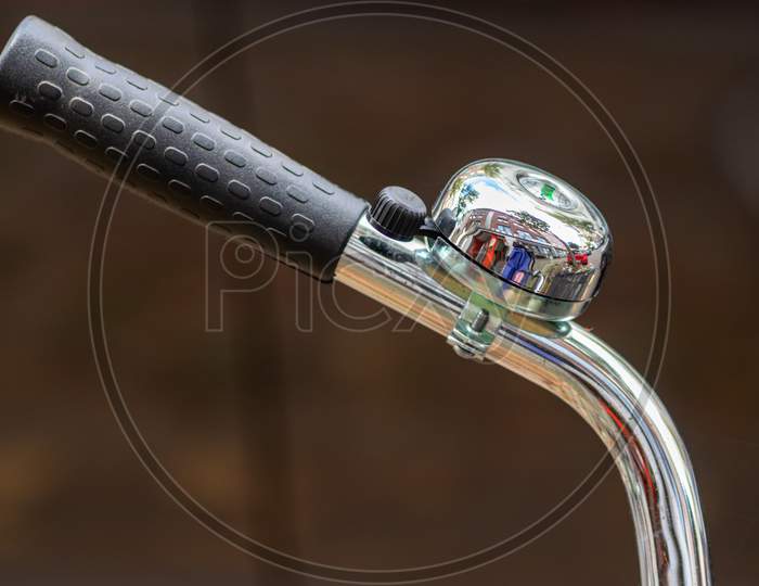 Beautiful splendid bike bell ensures security in the road traffic for bikers and pedestrians with a ringing noise as traffic safety and beautiful chromed decoration of a chromed handlebar