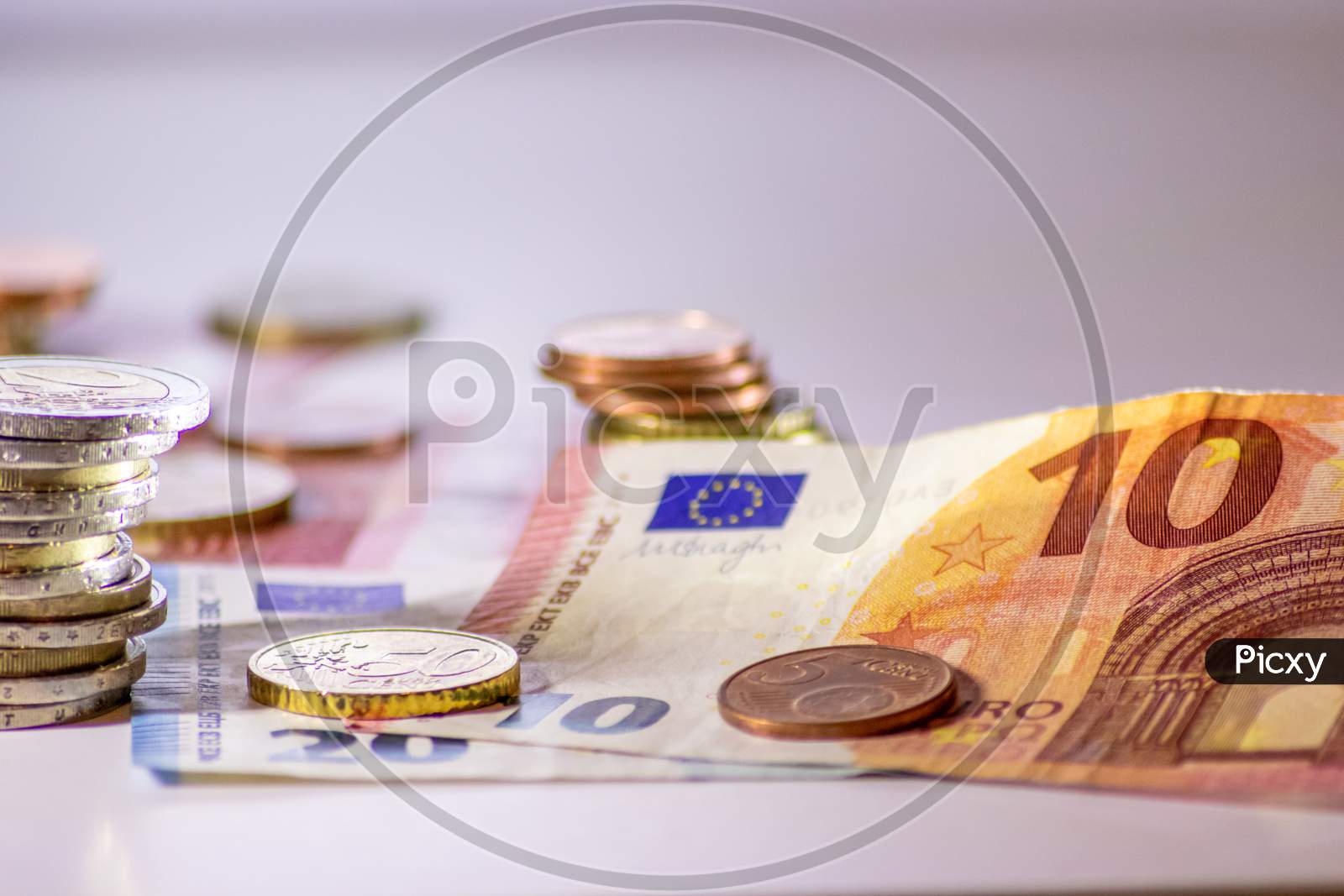 Bunch of european money with coins and bank notes show international finance with euro and europe, bets and wins or financial success as well as credit management and professional banking