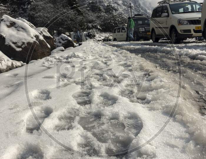 2Nd April, 2021, Yumthang Valley, Sikkim, India: Lots Of Foot Prints On Snow On Road.
