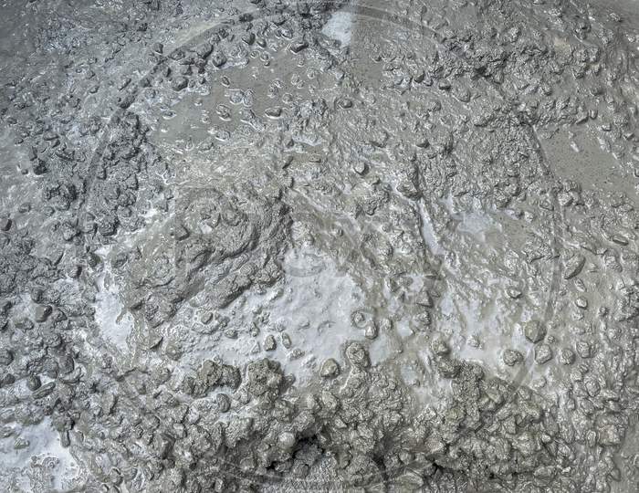 Fresh concrete prepared by mixing cement,sand and coarse aggregate.