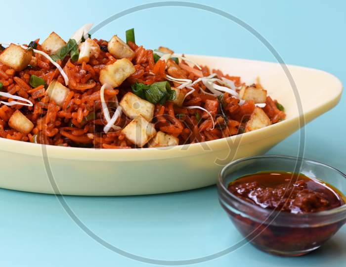 Schezwan Paneer Fried Rice With Schezwan Sauce,Chinese Fried Rice With Paneer,Indo-Chinese Cuisine Dishes. Selective Focus