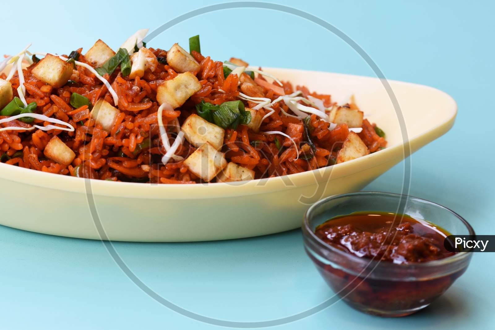 Schezwan Paneer Fried Rice With Schezwan Sauce,Chinese Fried Rice With Paneer,Indo-Chinese Cuisine Dishes. Selective Focus
