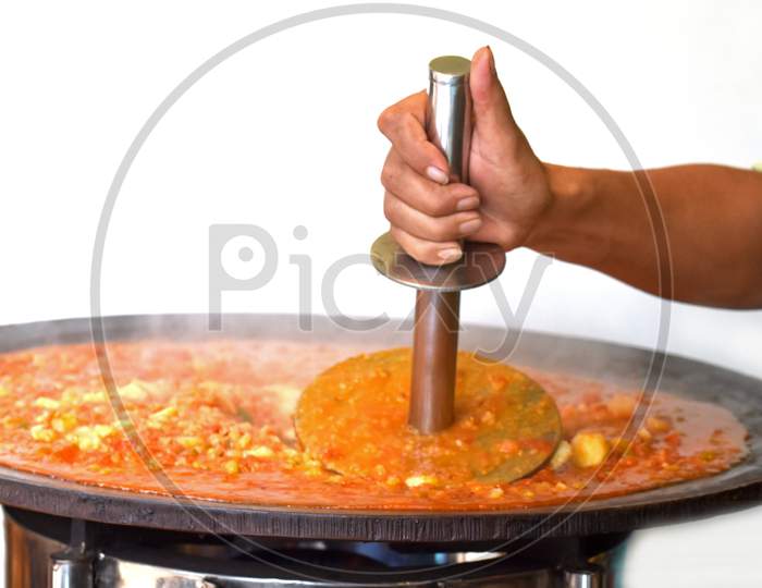 Pav Bhaji Being Cooked In The Streets Of India,Indian Mumbai Food Pav Bhaji,Pav Bhaji Is A Fast Food Dish From India, Thick And Spicy Vegetable Curry, Selective Focus