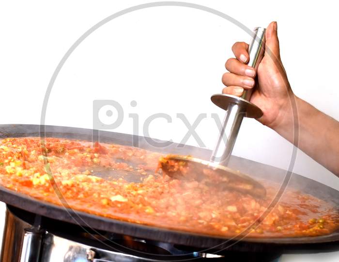 Pav Bhaji Being Cooked In The Streets Of India,Indian Mumbai Food Pav Bhaji,Pav Bhaji Is A Fast Food Dish From India, Thick And Spicy Vegetable Curry, Selective Focus
