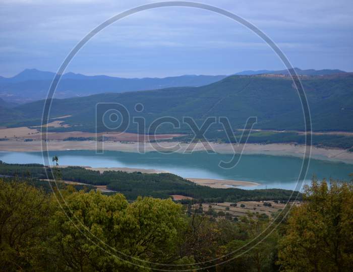 Views Of The Blue Lake Near The Dam.