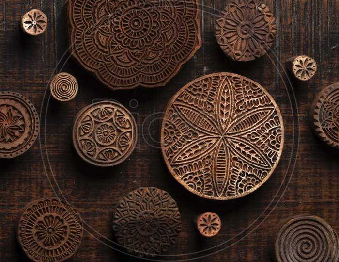 Round Shape Traditional Indian Wood Block Pattern For Textile Printing On Rustic Wood Background. Block Printing,Rajasthan India Block Printing,Wood Block Used For Handmade Textile Printing,Hand Craft