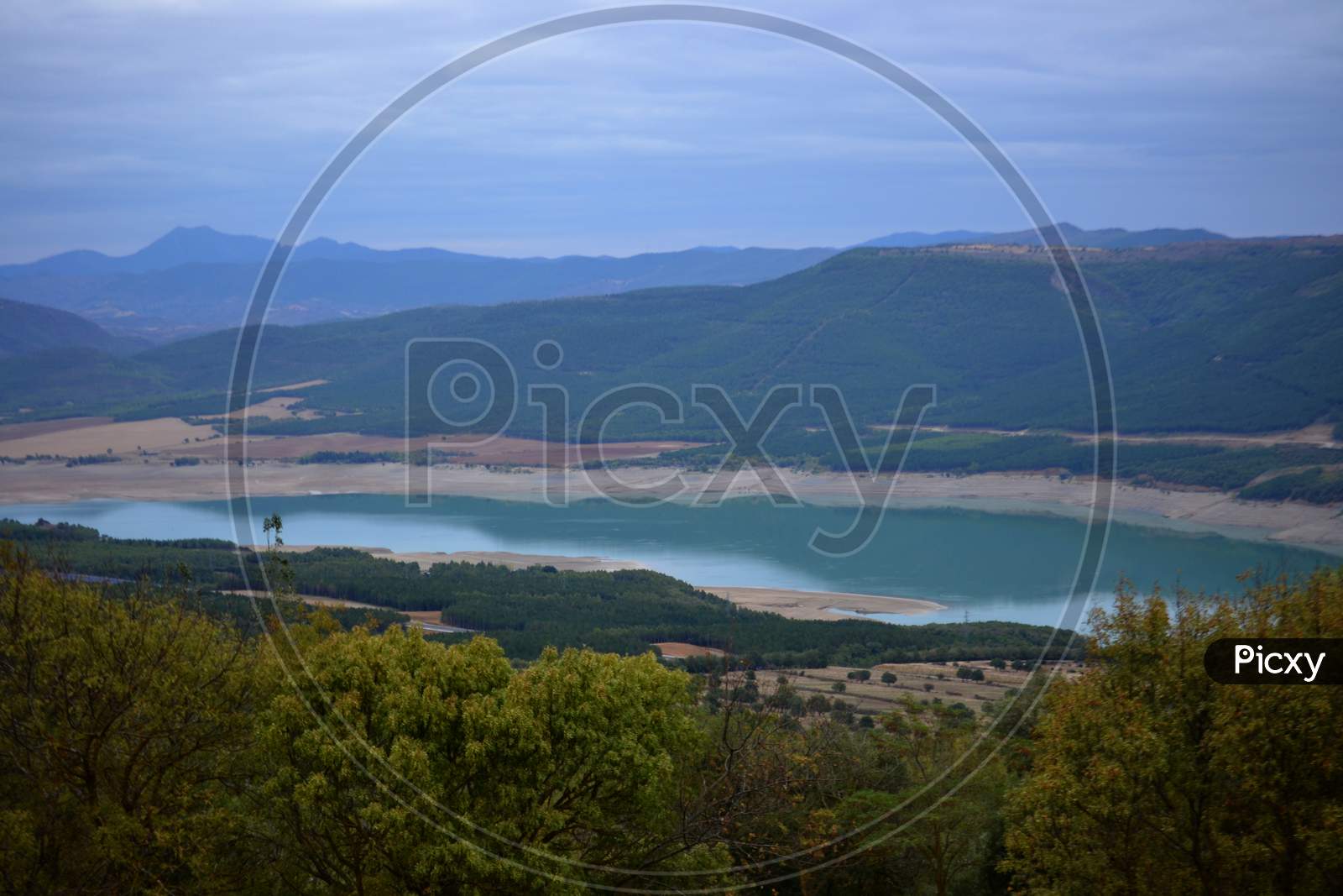 Views Of The Blue Lake Near The Dam.