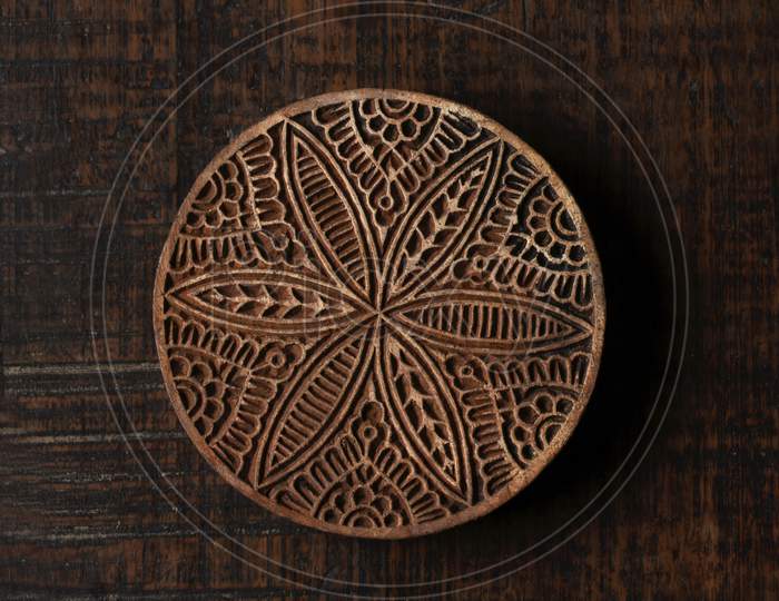 Round Shape Traditional Indian Wood Block Pattern For Textile Printing On Rustic Wood Background. Block Printing,Rajasthan India Block Printing,Wood Block Used For Handmade Textile Printing,Hand Craft