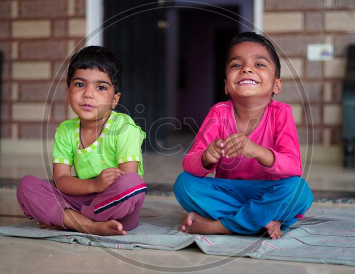 Worldwide Yoga Day Concept. Indian Little Children Laughing And Joking Along With Yoga.
