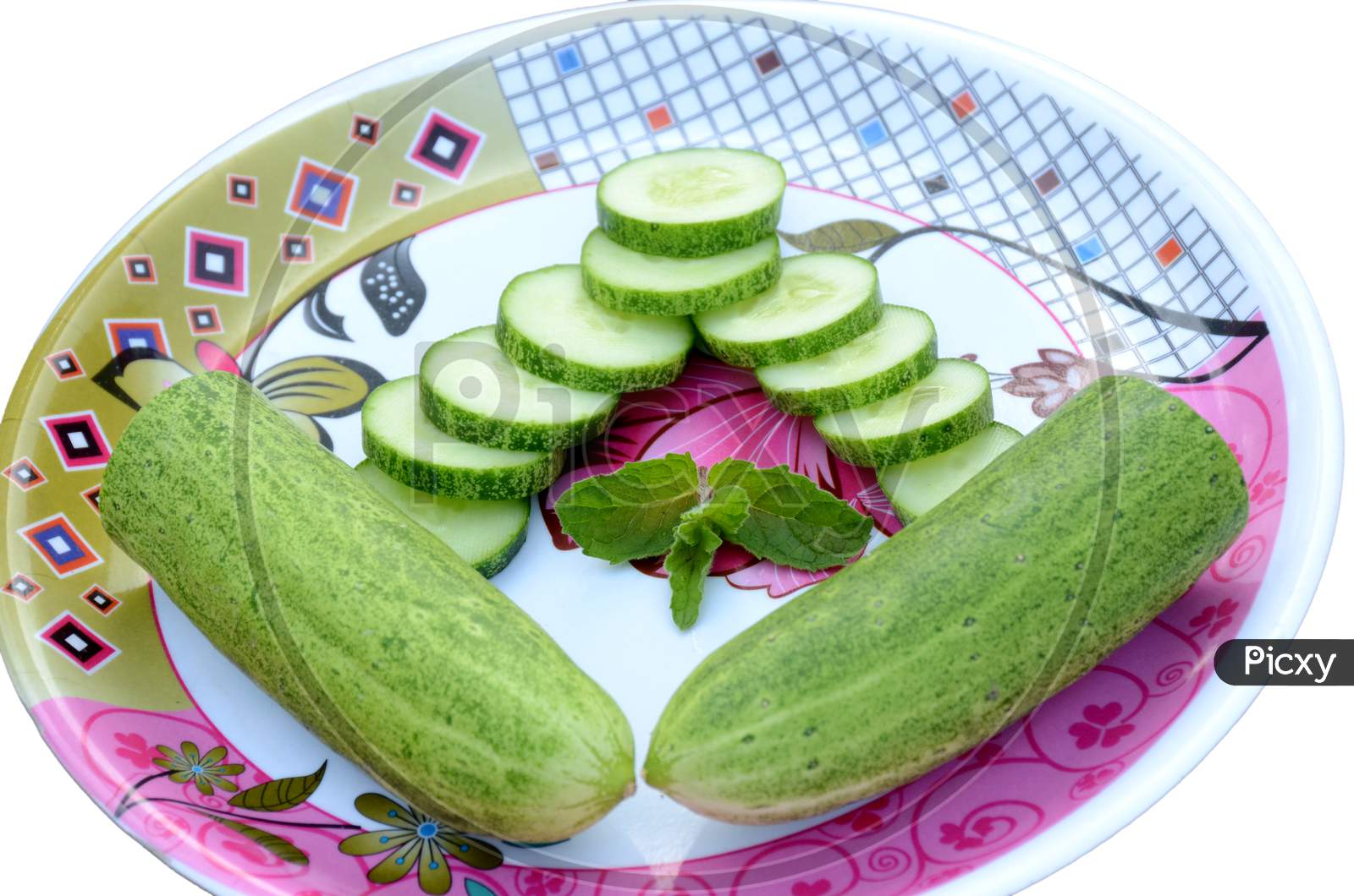 Closeup Sliced Green Ripe Cucumber With Mint In The Plate Isolated On White Background.