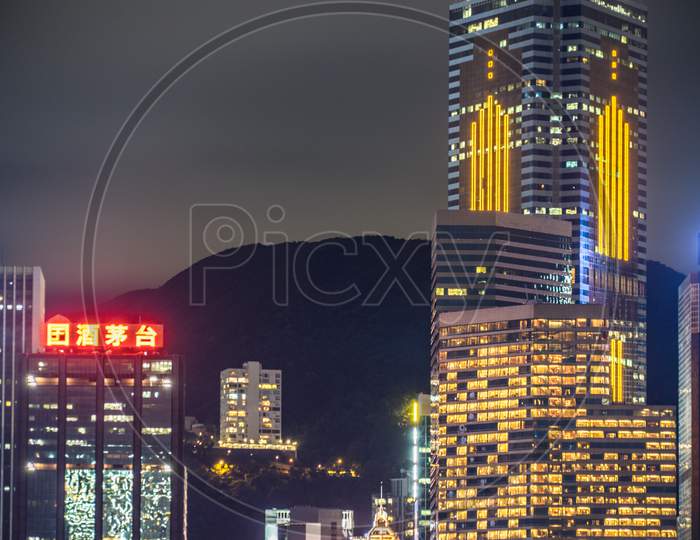 Hong Kong Night View Seen From The Victoria Harbor