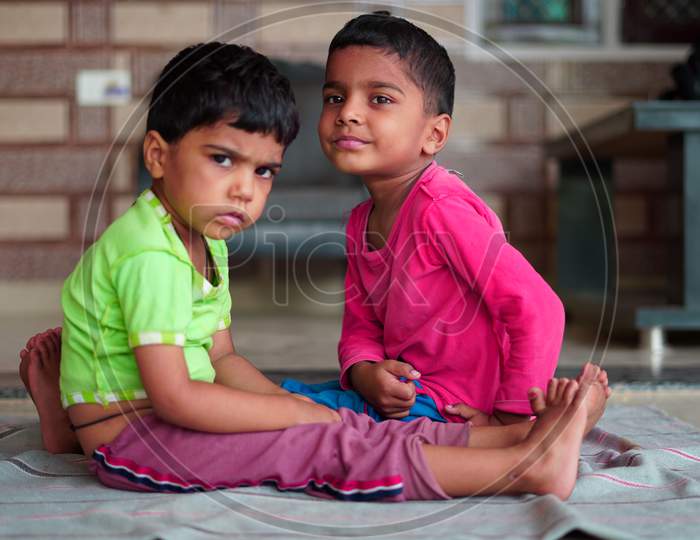 Indian Little Boy And Girl Exercising At Home. Family Working Out At Home. Worldwide Yoga Day Concept.