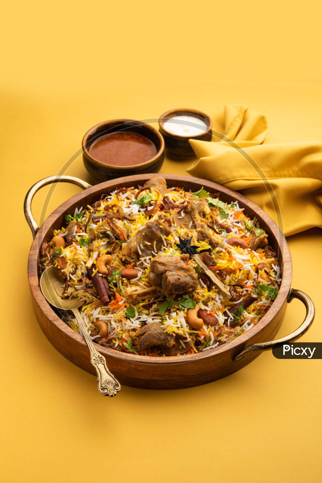 Image of Indian Mutton Biryani Prepared In Basmati Rice Served With