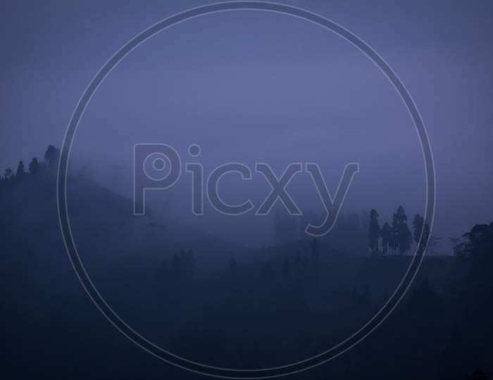A Misty Evening At Darjeeling, India