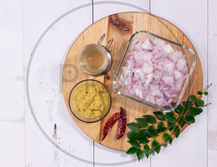 Ingrediants- Chopped Onion, Ginger Garlic Paste,Curry Leaves ,Cooking Oil And Dry Chilli