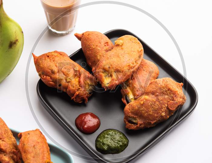 Image of Banana Fritter Or Pakora Or Raw Kela Pakoda Or Bajji Served ...