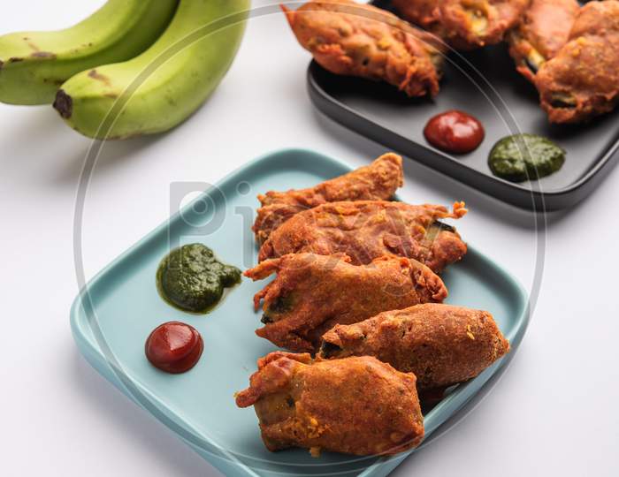 Image of Banana Fritter Or Pakora Or Raw Kela Pakoda Or Bajji Served ...