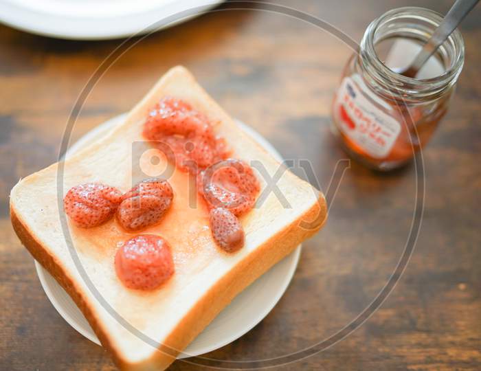 Strawberry Jam And Thick Bread