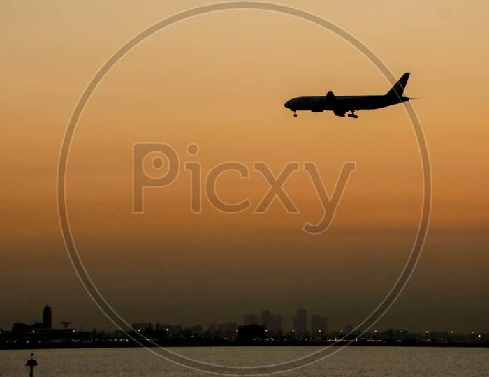 Airplane Silhouette And Sky Image