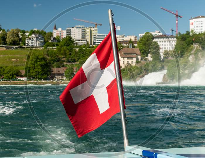 Swiss Flag On A Small Boat At The Rhine Falls In Switzerland 28.5.2021
