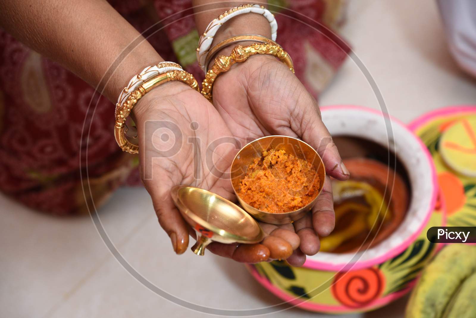 Showing Of Haldi Or Turmeric Paste In Indian Bengali Marriage Ceremony.