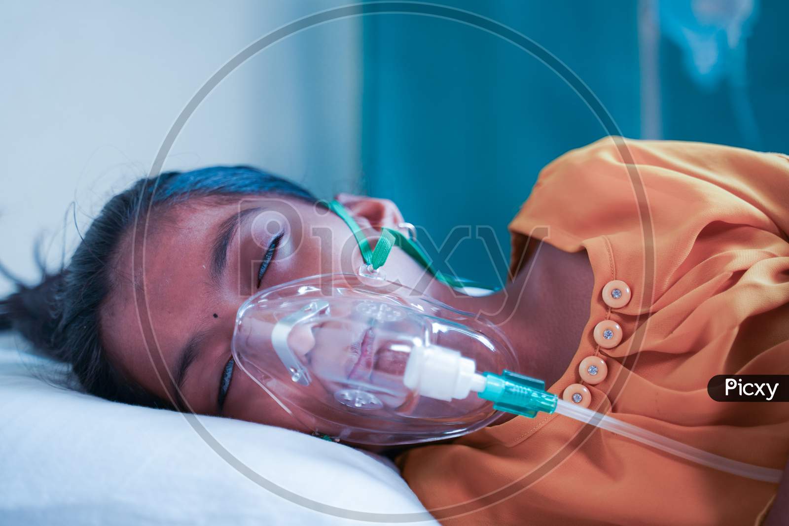 Little Girl Kid Breathing On Ventilator Oxygen Mask Due To Coronavirus Covid-19 Breathing Shortness Or Dyspnea Infection - Concept Of Children Healthcare And Medical During Third Wave Pandemic Outbreak