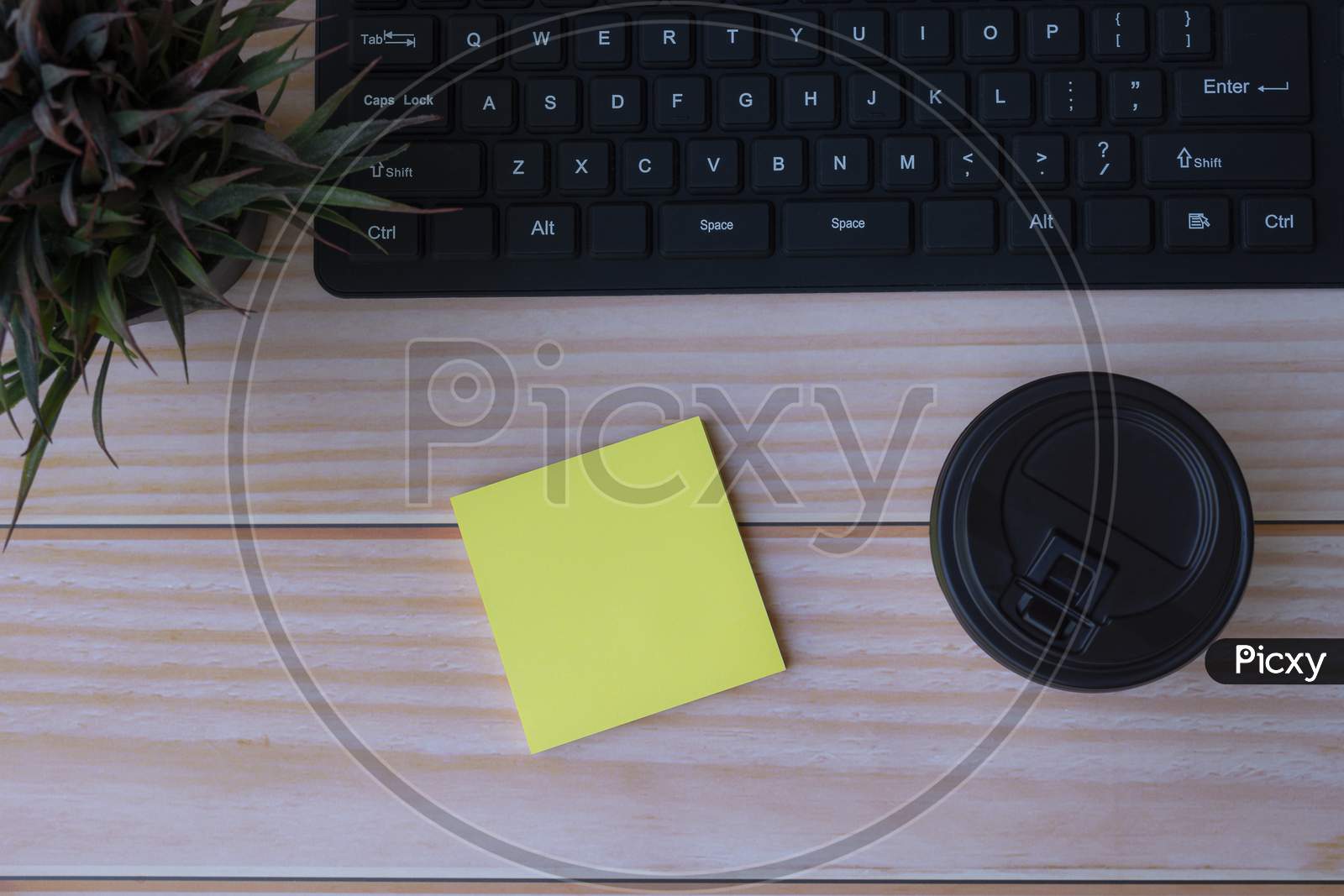 Yellow Note On Wooden Table. Space For Text. Flat Lay, Top View