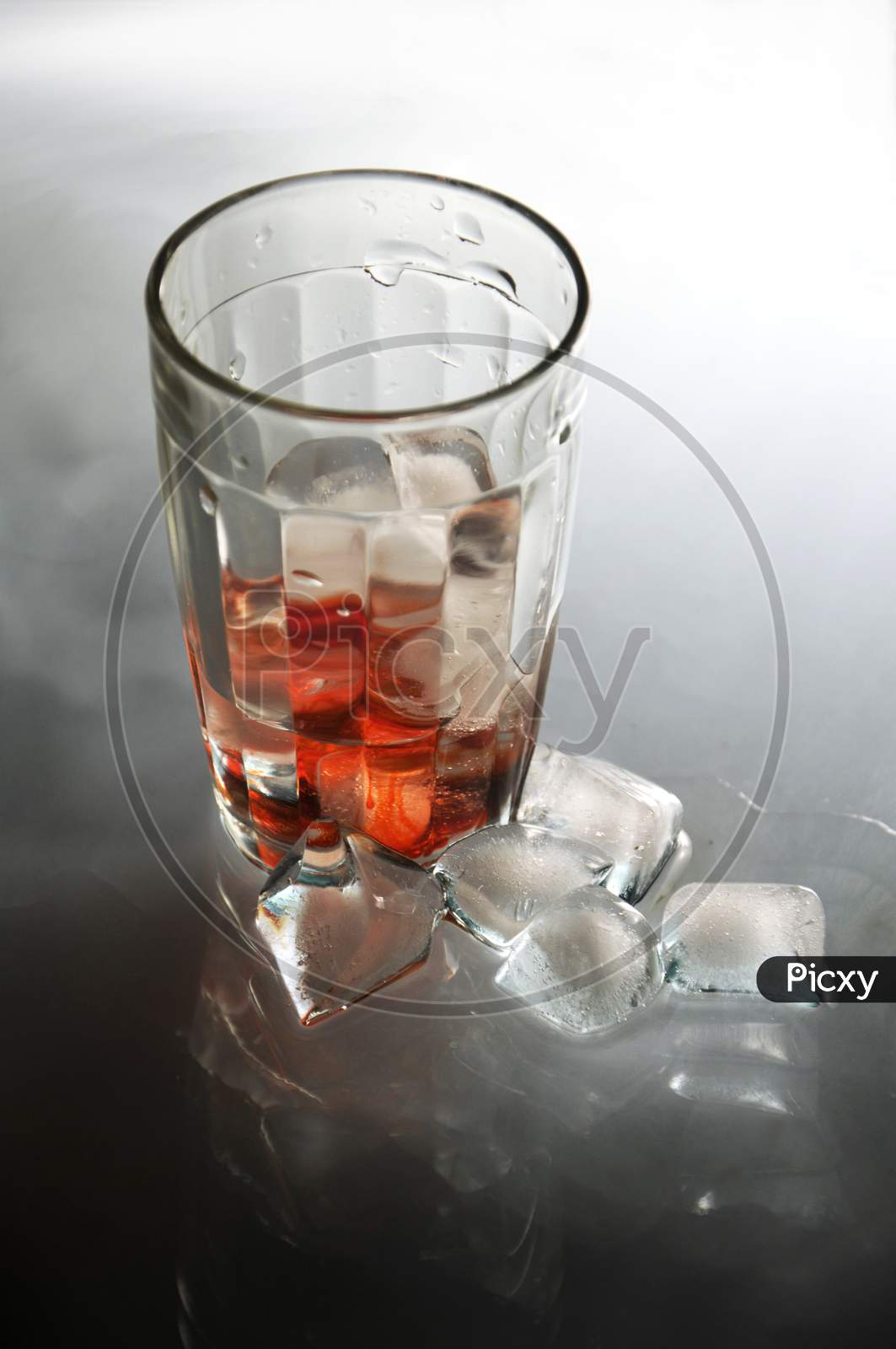 Glass Of Soda Water With Ice Cubes