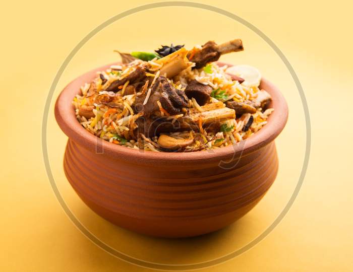 Dum Handi Mutton Biryani Or Gosht Pilaf Is Prepared In An Earthen Or Clay Pot Called Haandi Or 1 Kilo Size. Popular Indian Non Vegetarian Food