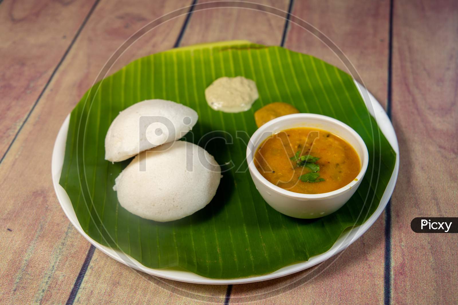 Tasty Indian Idly With Chutney And Sambar