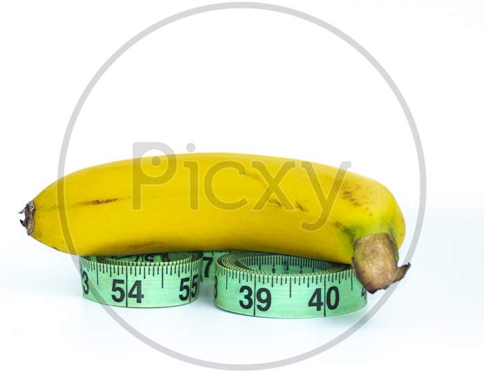 Banana With Measuring Tape Isolated On White