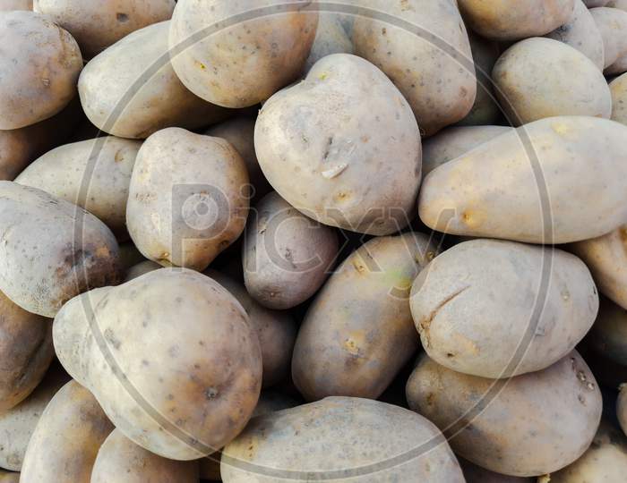 Potatoes In Market For Sale With Mixed Quality Bad And Good