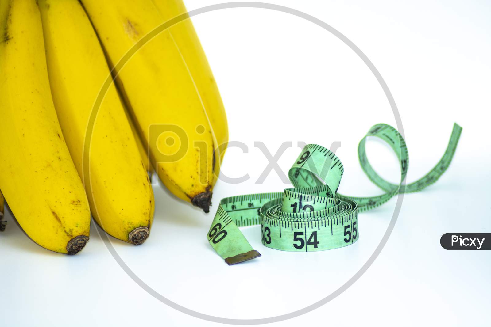 Bunch Of Banana With Measuring Tape Isolated On White