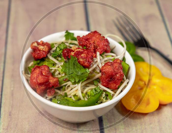 Mouth Watering Gobi Noodles With Coriander And Capsicum