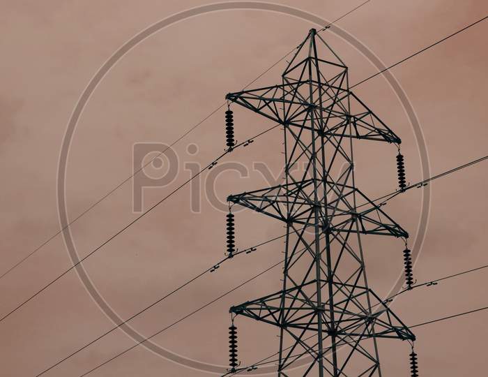 Electric Supply Tower Isolate On Sky Background, Industrial Presentation Concept.
