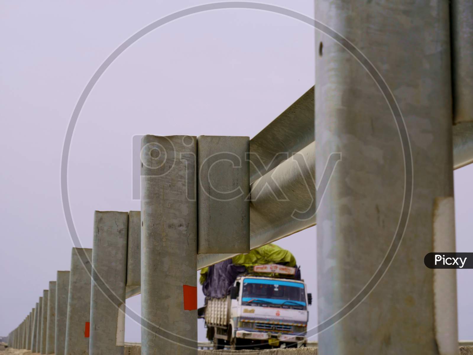 Transportation Bridge Construction Center Frame Blur Truck Shot On Road.