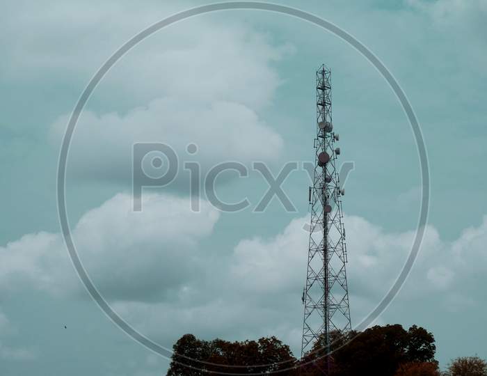 Mobile Network Tower On Sky Isolate, Communication Industrial Image.