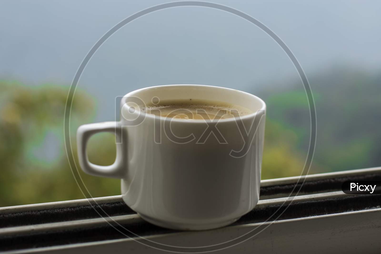 A Cup Of Tea With The View Of Gangtok City. Selective Focus.