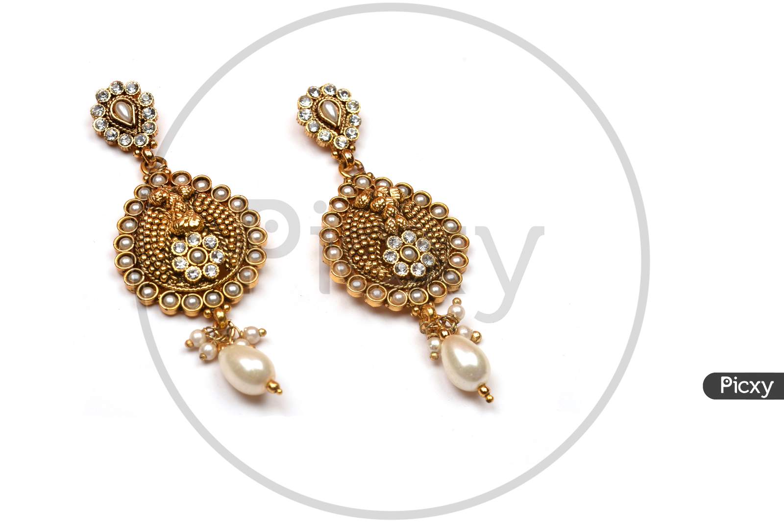 Beautiful Golden Pair Of Earrings,Pearls Earrings On White Background. Luxury Female Jewelry, Indian Traditional Jewellery, Kundan Earring,Bridal Gold Earrings Wedding Jewellery