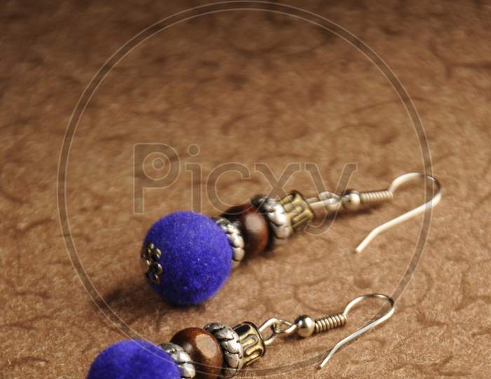 Close-Up Of A Pair Of Earrings