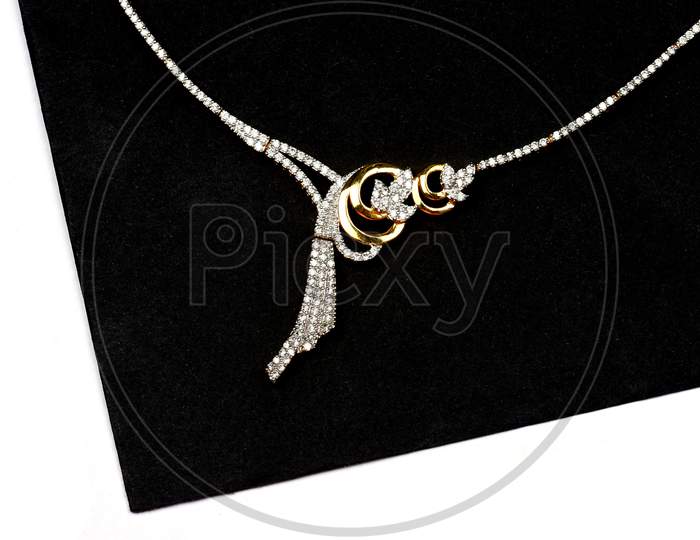 Diamond Jewelry Placed On Black And White Background, Diamond Pendant,Diamond Jewellery, Diamond Necklace