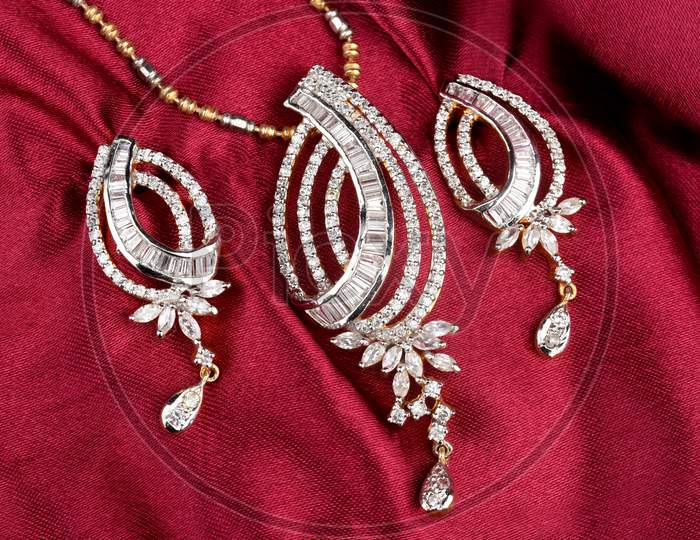 Diamond Jewelry Placed On Cloth With Earrings Diamond Pendant,Diamond Jewellery