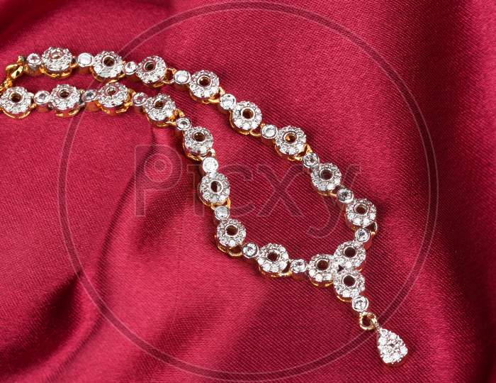 Diamond Jewelry Placed On Cloth, Diamond Pendant,Diamond Jewellery, Diamond Necklace
