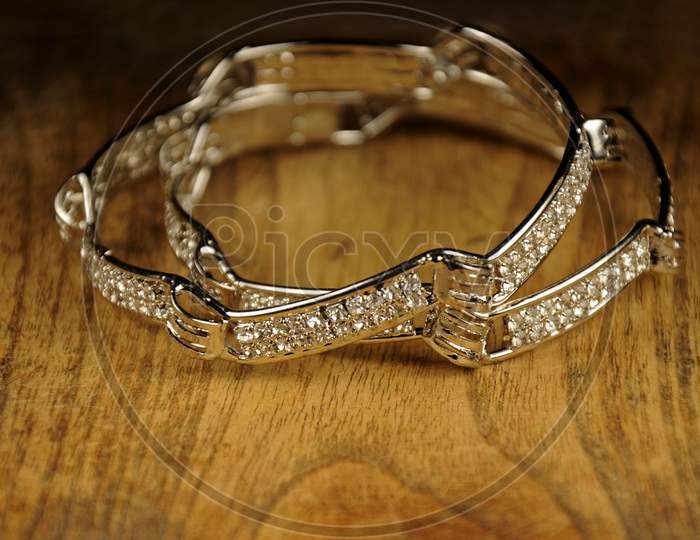 Diamond Bangles On Wooden Background,  Indian Traditional Jewelry