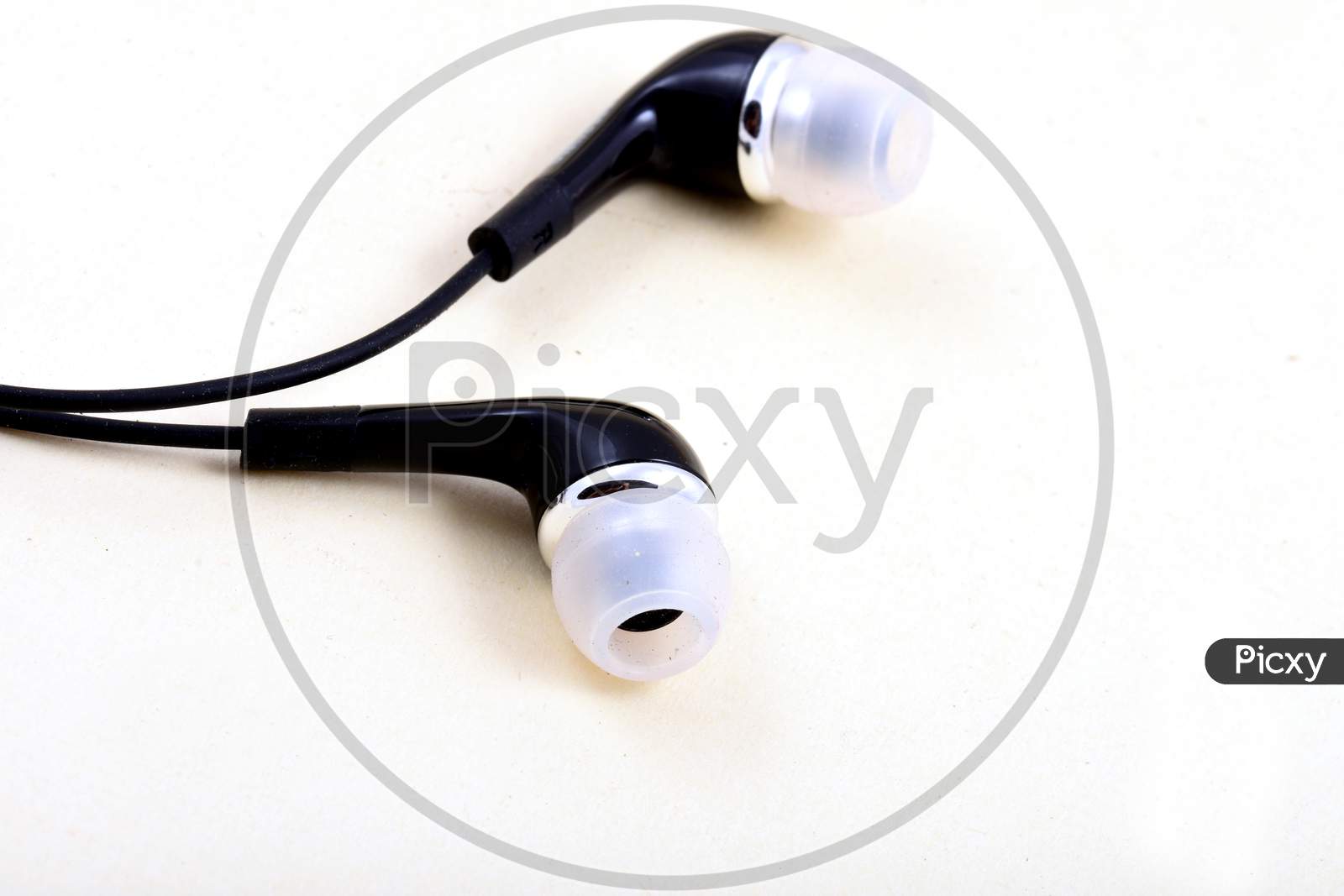 Closeup Of Earphones Isolated On White Background