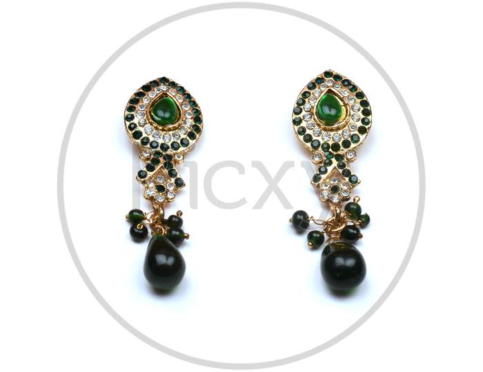 Beautiful Golden Pair Of Earrings Diamonds Gemstones On White Background. Luxury Female Jewelry, Indian Traditional Jewellery, Kundan Earring,Bridal Gold Earrings Wedding Jewellery